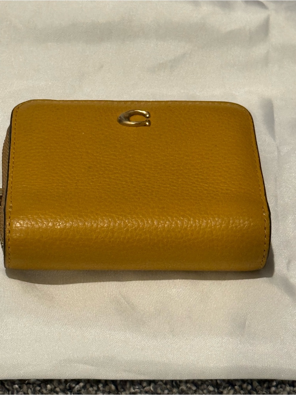 Coach Mustard Leather Compact Wallet with Gold 'C' Accent